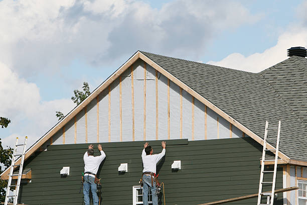 Professional Siding Installation technician working in Midland, WA